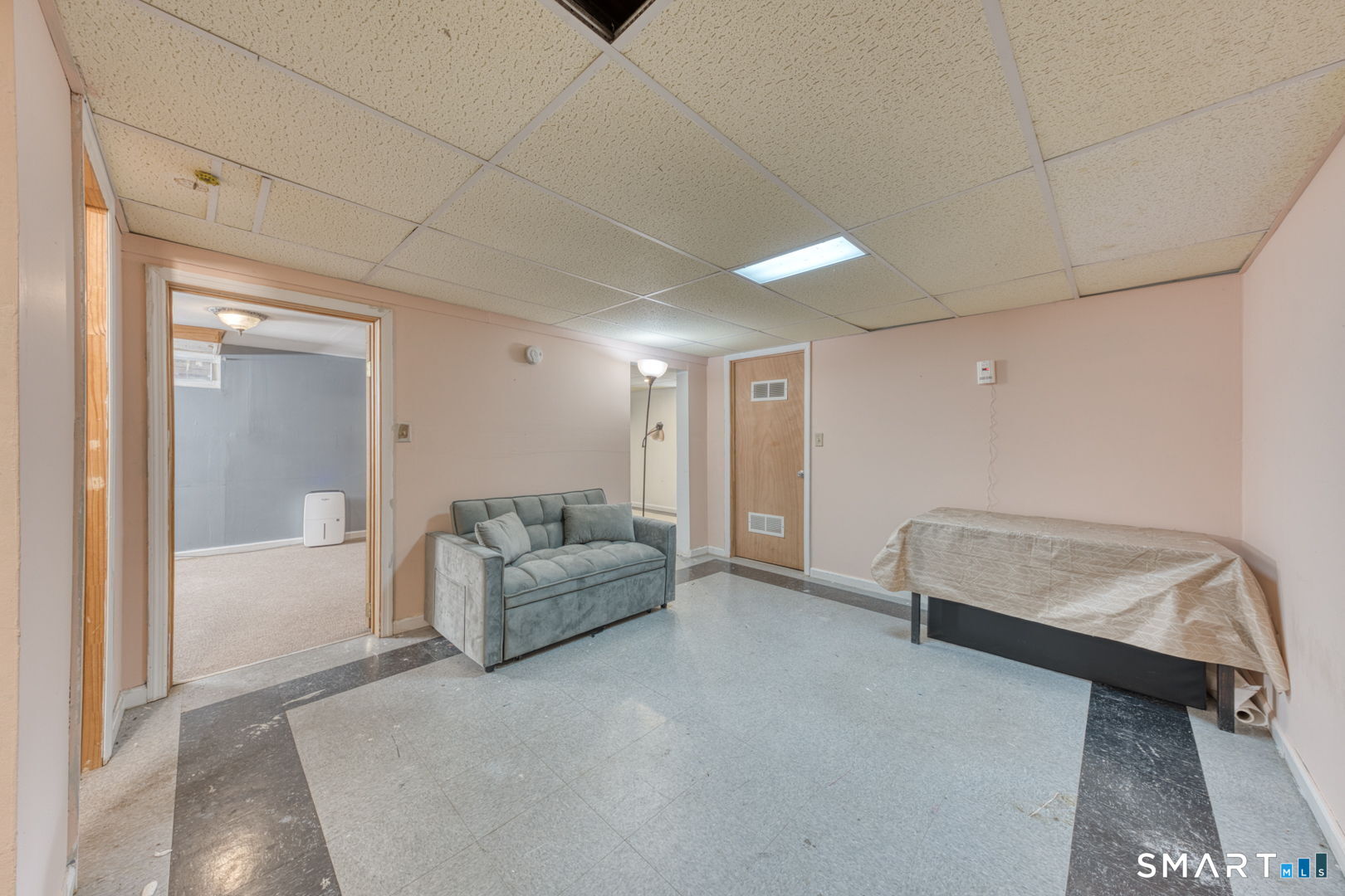 160 Windbrook Drive Windsor, CT 06095 - Photo 26 of 35 a spacious bedroom with a bed and a couch