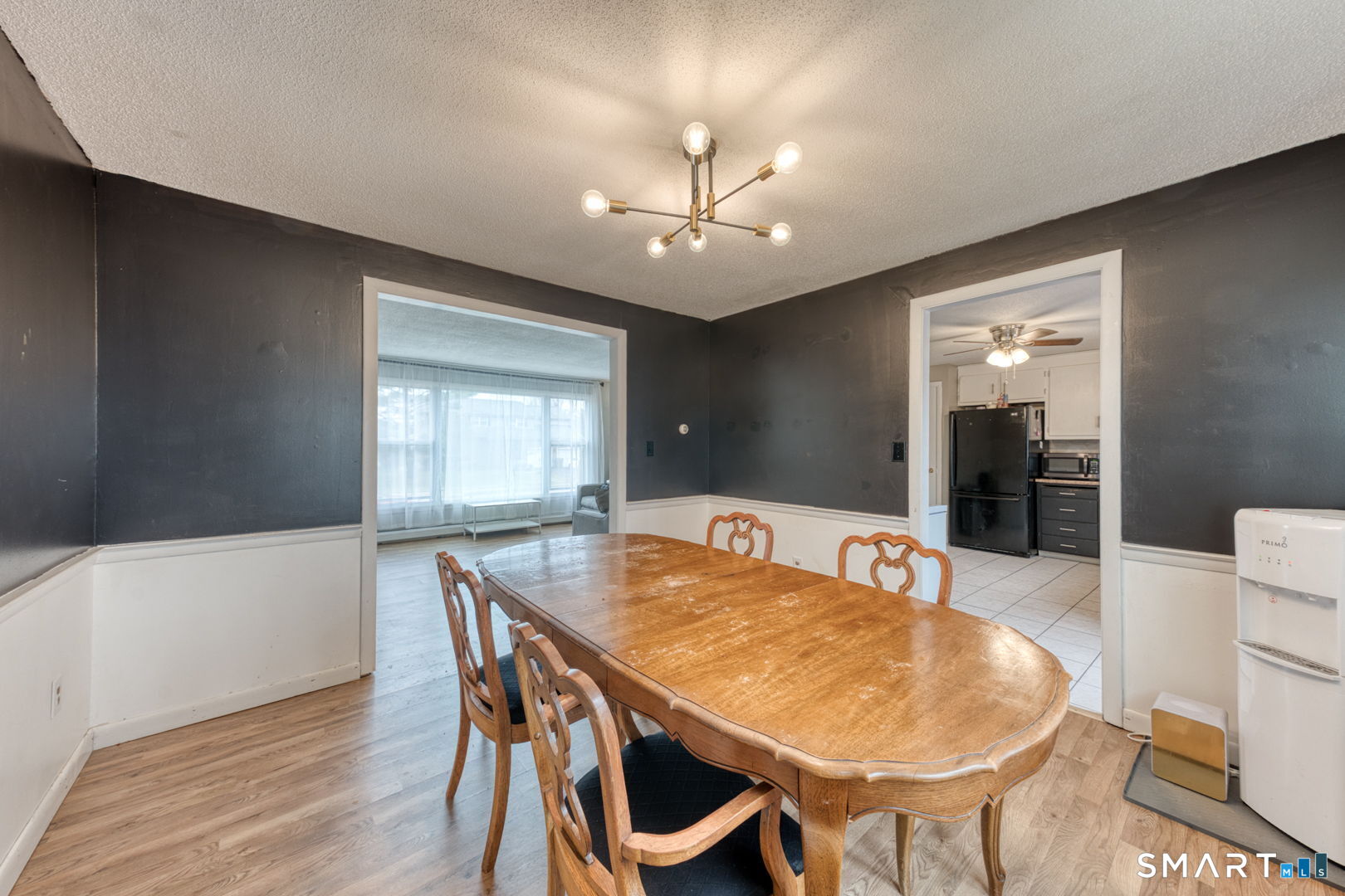 160 Windbrook Drive Windsor, CT 06095 - Photo 8 of 35 a view of a dining room with furniture and wooden floor