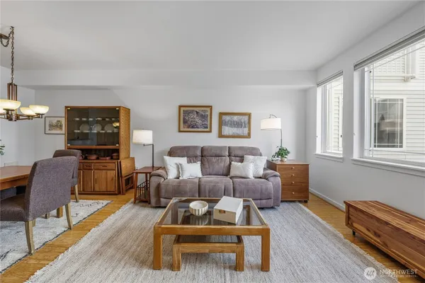 a spacious bedroom with a bed and a large window