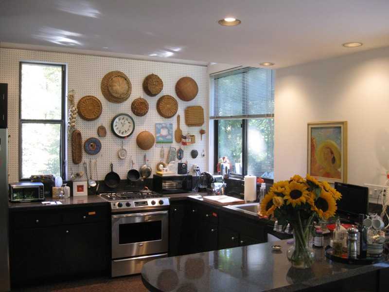 29 Angus Lane Greenwich, CT 06831 - Photo 4 of 14 a kitchen with stainless steel appliances granite countertop a sink a stove and a window