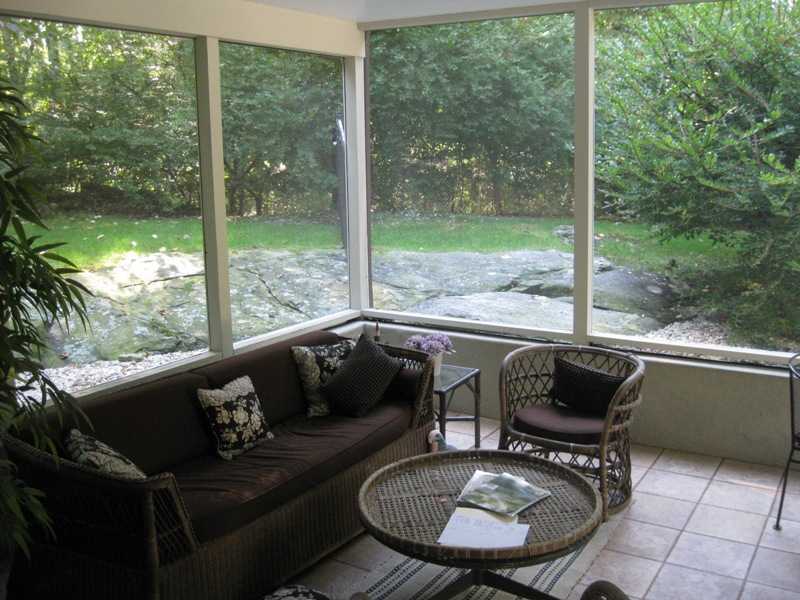 29 Angus Lane Greenwich, CT 06831 - Photo 6 of 14 a living room with furniture and a table