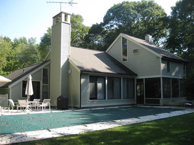 29 Angus Lane Greenwich, CT 06831 - Photo 7 of 14 a view of a house with backyard and trees