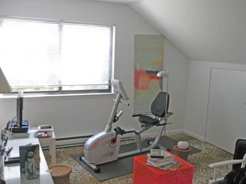 29 Angus Lane Greenwich, CT 06831 - Photo 9 of 14 a room with furniture a rug and a window