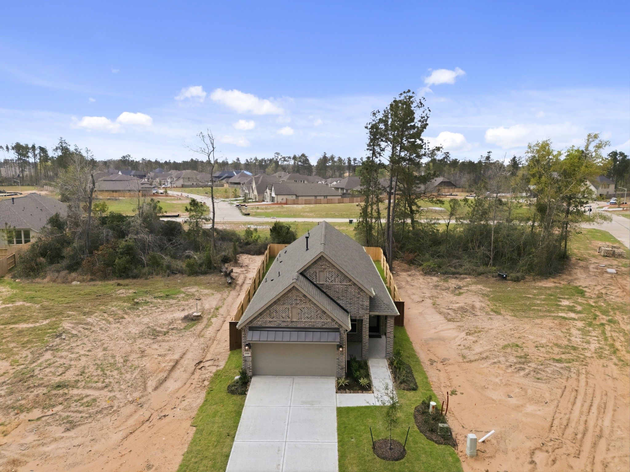 12806 Meadow Wind Way Conroe, TX 77302 - Photo 26 of 37 a view of a lake with a big yard