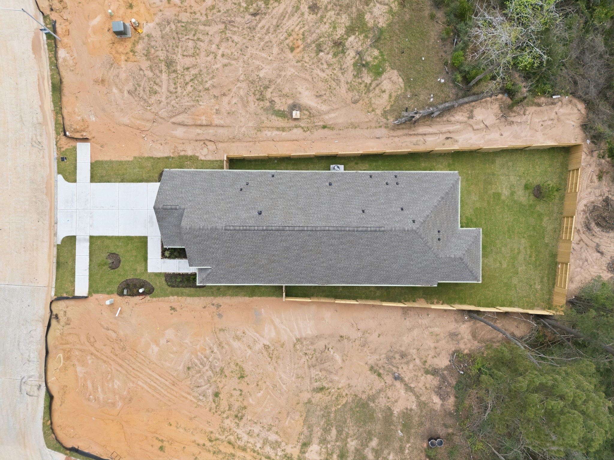 12806 Meadow Wind Way Conroe, TX 77302 - Photo 27 of 37 an aerial view of a house with a yard
