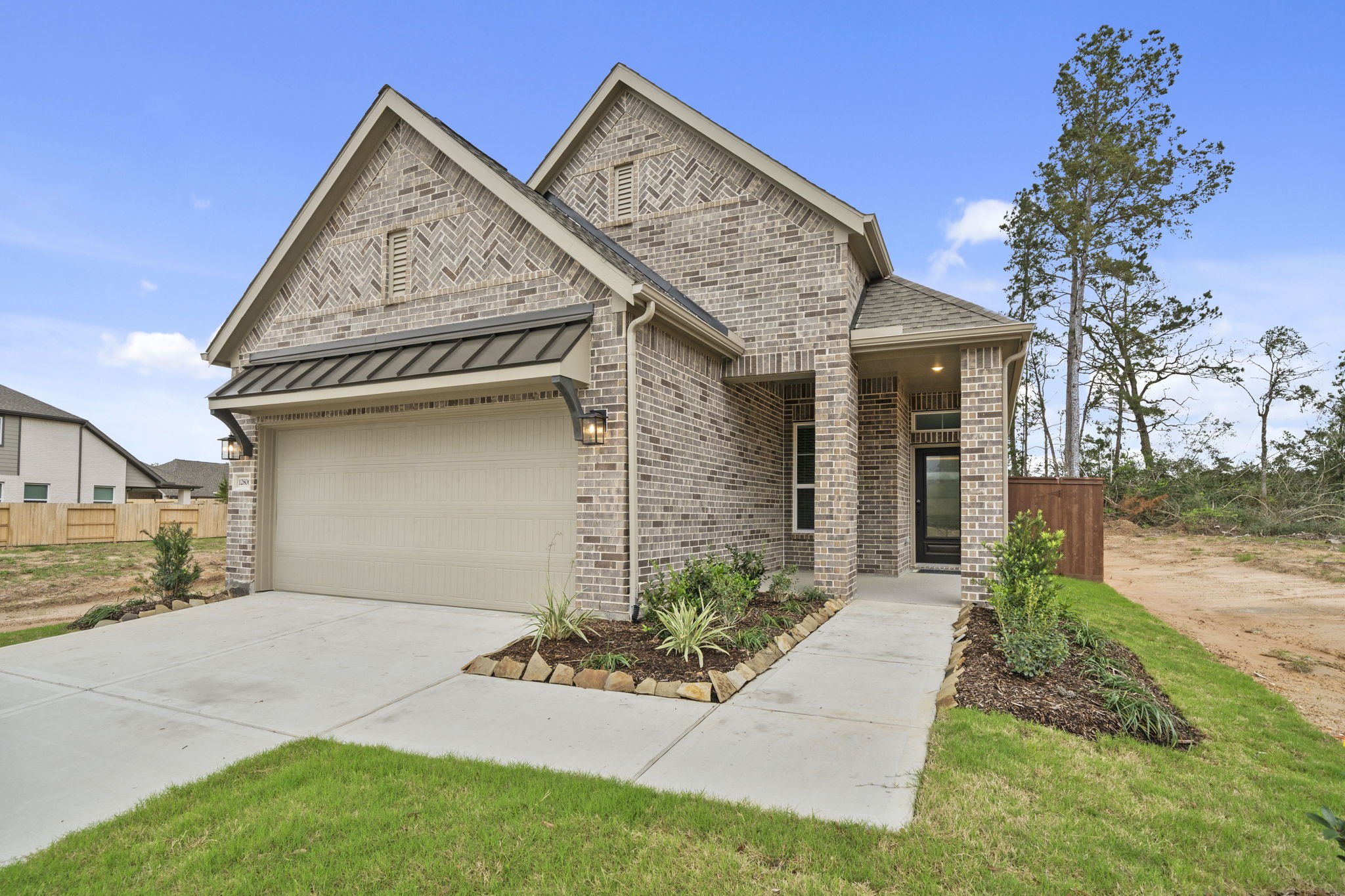 12806 Meadow Wind Way Conroe, TX 77302 - Photo 30 of 37 a view of a house with a yard and potted plants