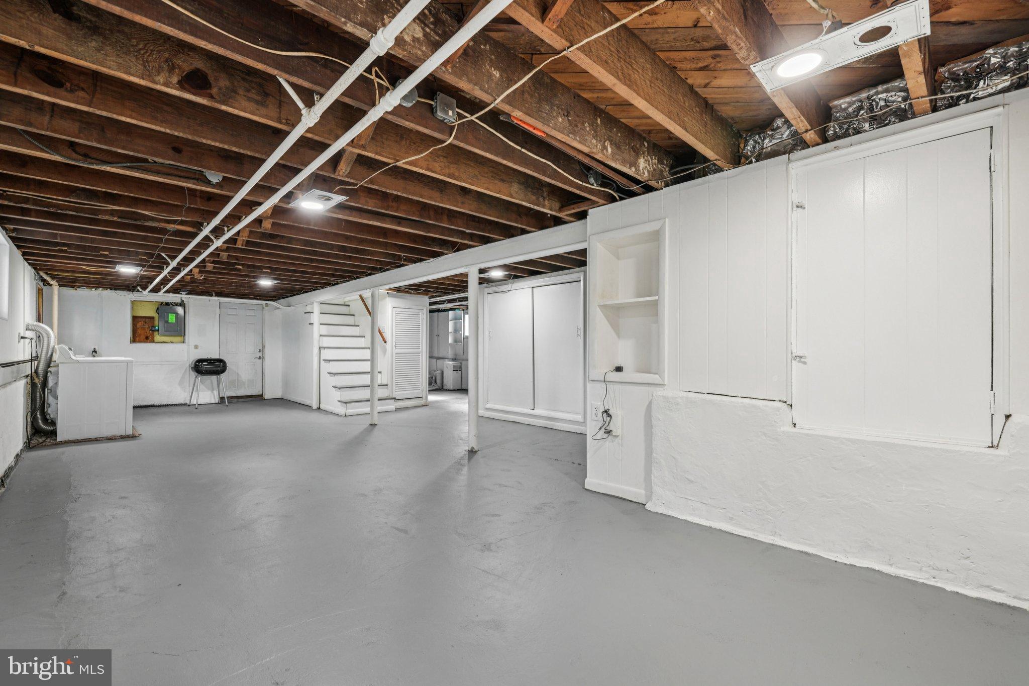 6907 Moyer Avenue Baltimore, MD 21234 - Photo 27 of 48 Spacious, versatile basement with rustic charm.