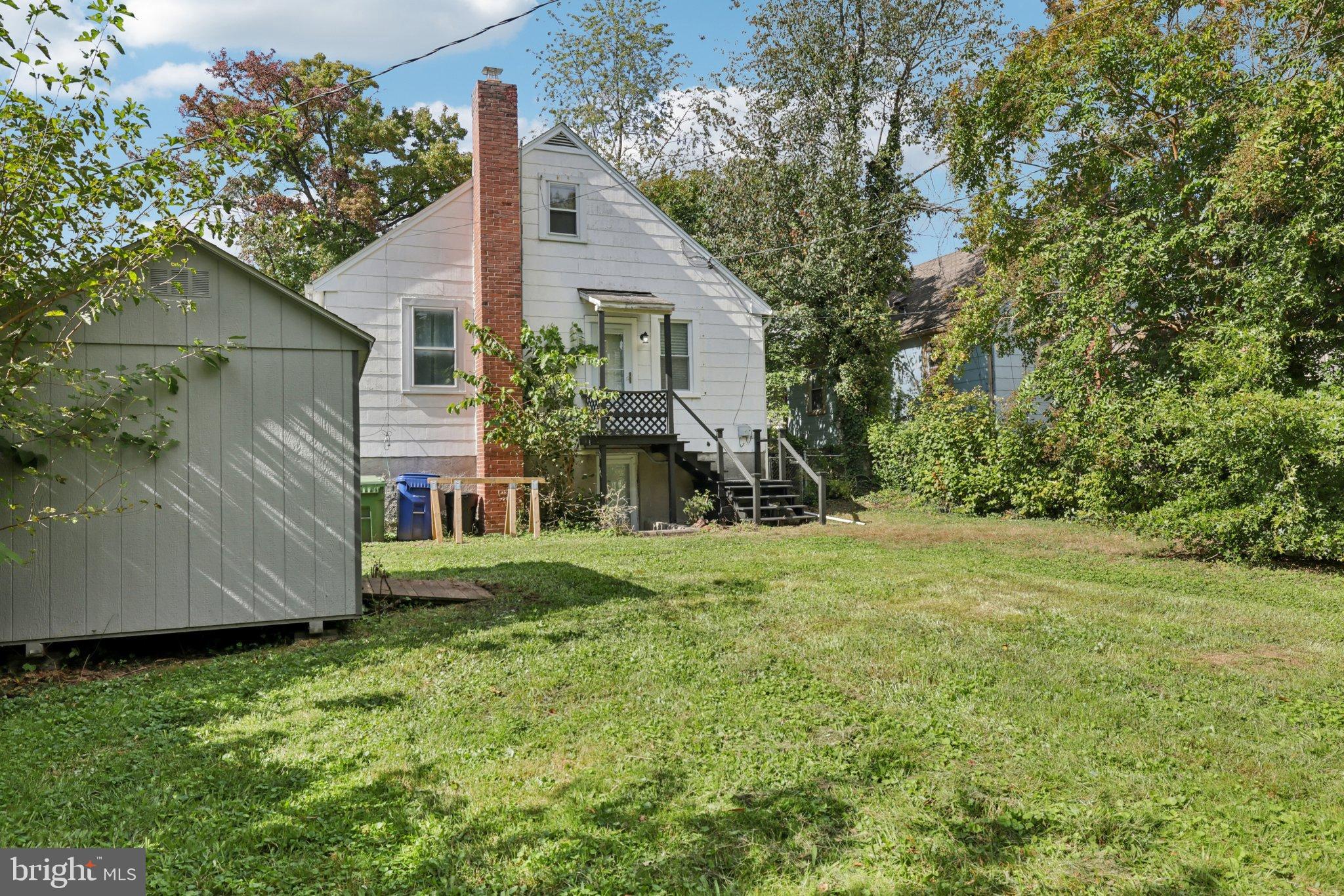 6907 Moyer Avenue Baltimore, MD 21234 - Photo 37 of 48 Charming home nestled in lush greenery.