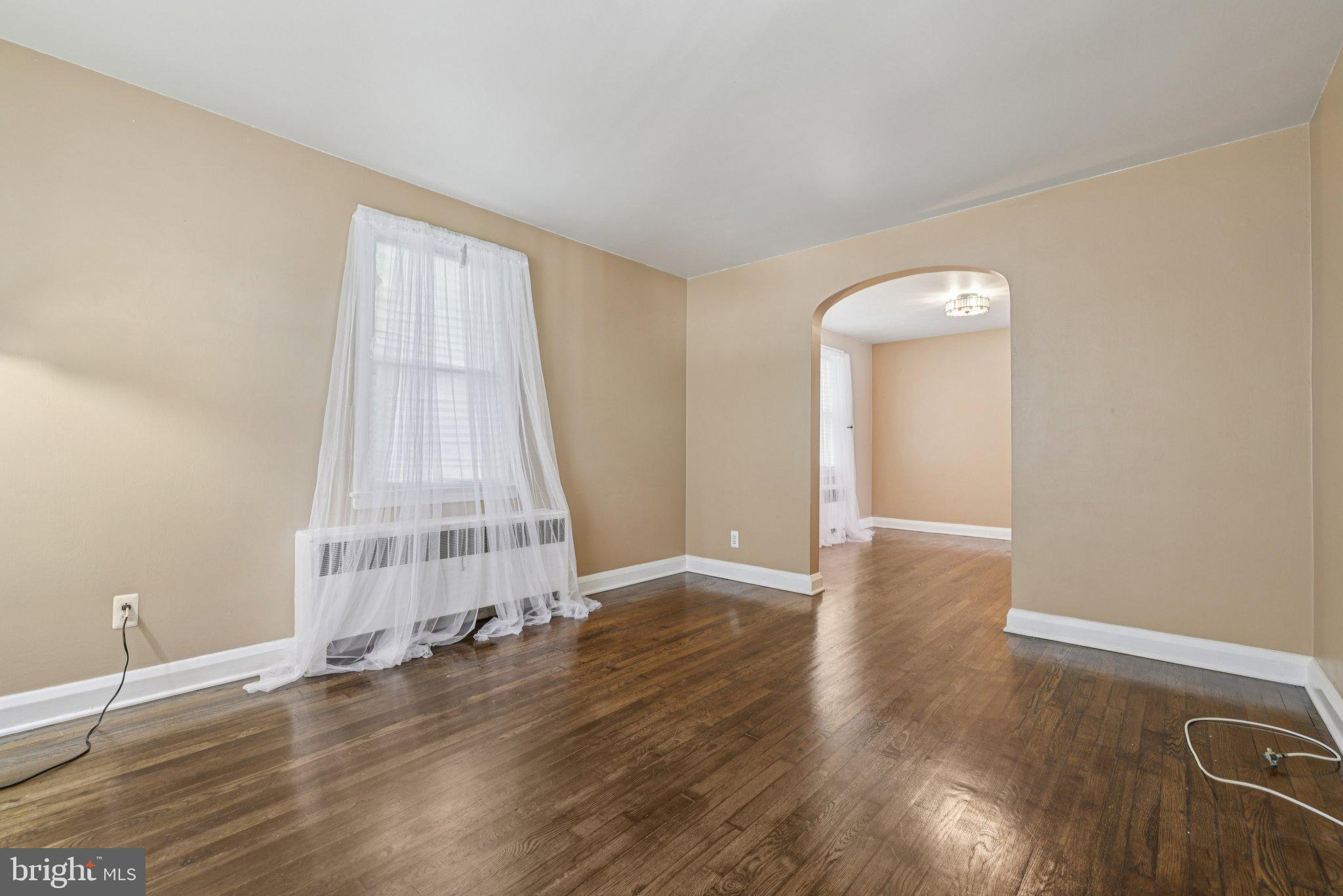 6907 Moyer Avenue Baltimore, MD 21234 - Photo 9 of 48 Bright and airy space with elegant arches.