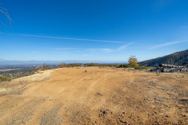 a view of an ocean and mountain