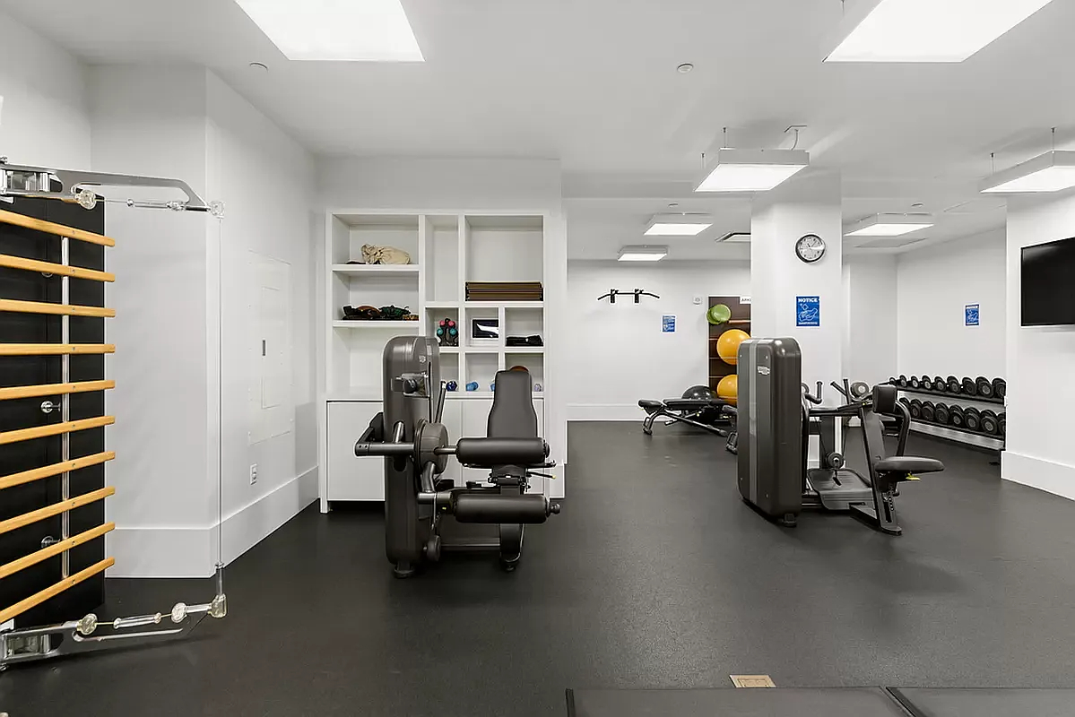 404 Park Avenue South, Unit 8/D Manhattan, NY 10016 - Photo 14 of 15 a view of a room with gym equipment