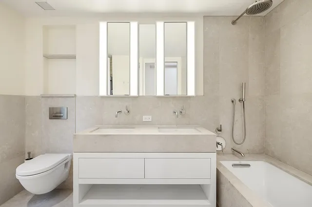 a bathroom with a sink and a bathtub