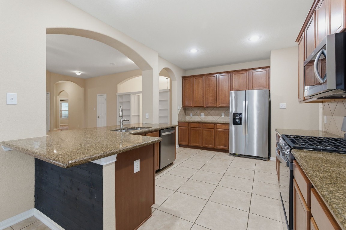21822 Mount Hunt Drive Spring, TX 77388 - Photo 11 of 26 Spacious kitchen with abundant cabinetry for all your storage needs.