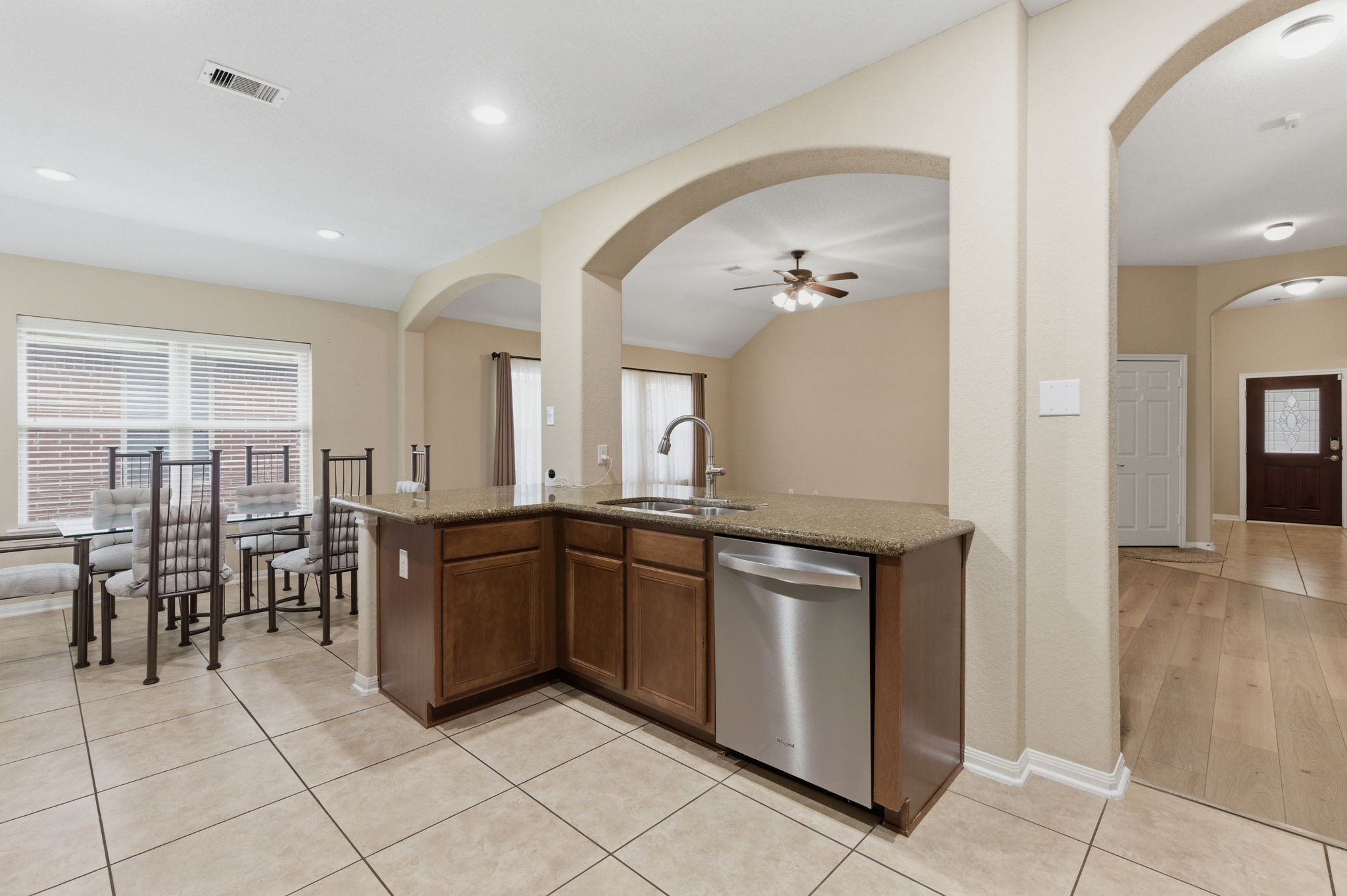 21822 Mount Hunt Drive Spring, TX 77388 - Photo 13 of 27 Easy flow in this beautiful kitchen.