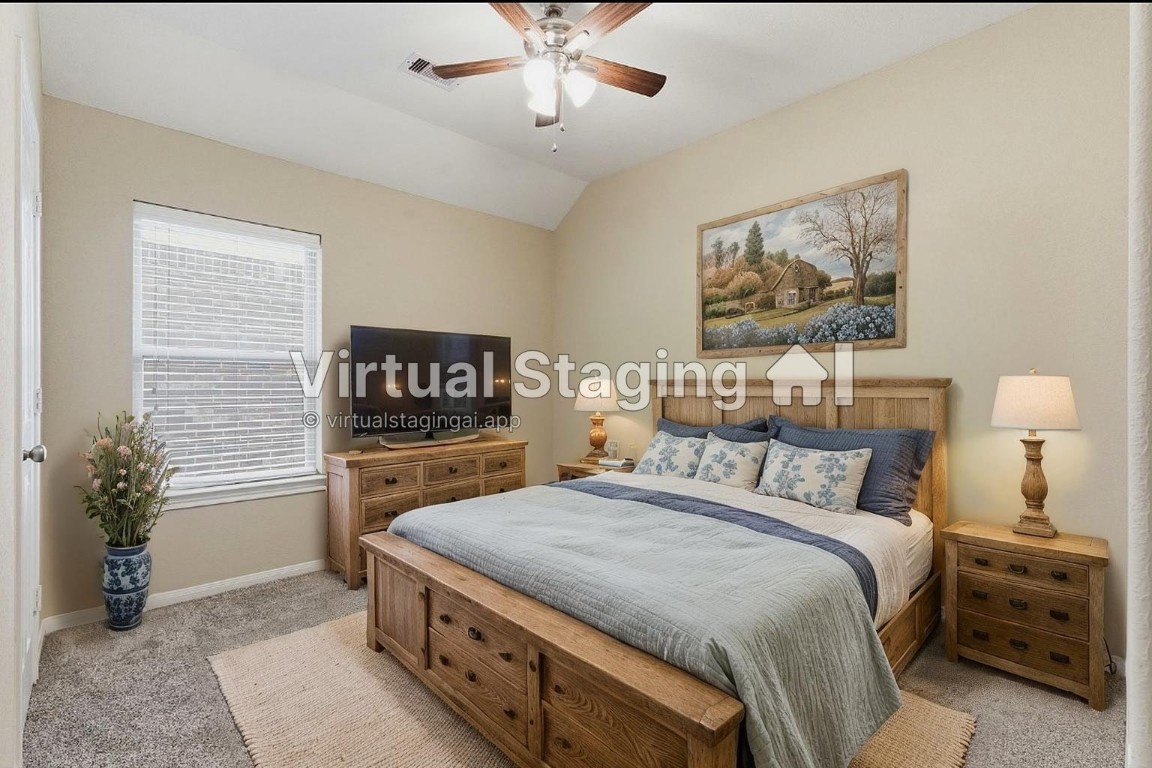 21822 Mount Hunt Drive Spring, TX 77388 - Photo 20 of 26 Cozy and inviting second bedroom featuring ample natural light and elegant decor, perfect for guests or a personal retreat. Virtually staged!