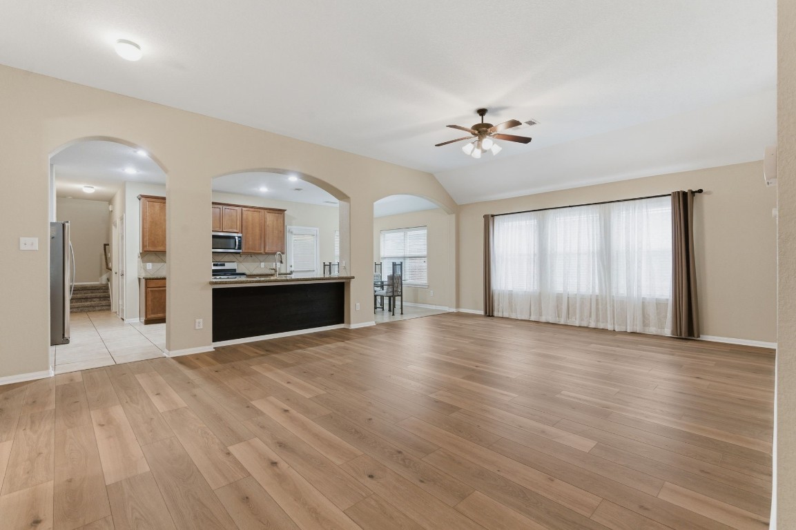 21822 Mount Hunt Drive Spring, TX 77388 - Photo 2 of 26 Stunning new flooring enhances the spacious family room.