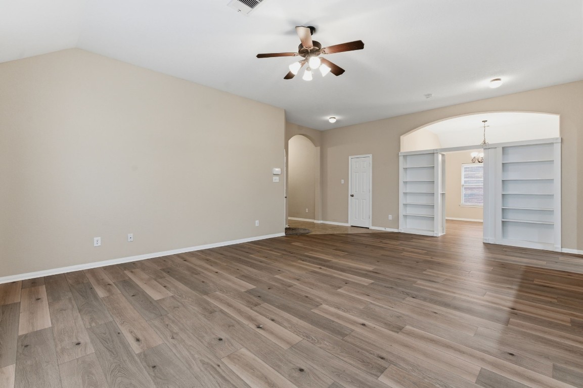 21822 Mount Hunt Drive Spring, TX 77388 - Photo 5 of 26 Elegant custom shelves frame the entrance to the study.