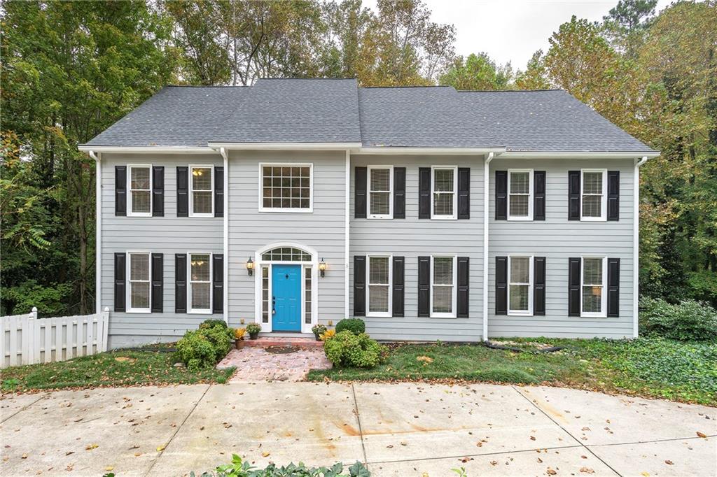 684 Colston Road Marietta, GA 30064 - Photo 1 of 1 a front view of a house with garden