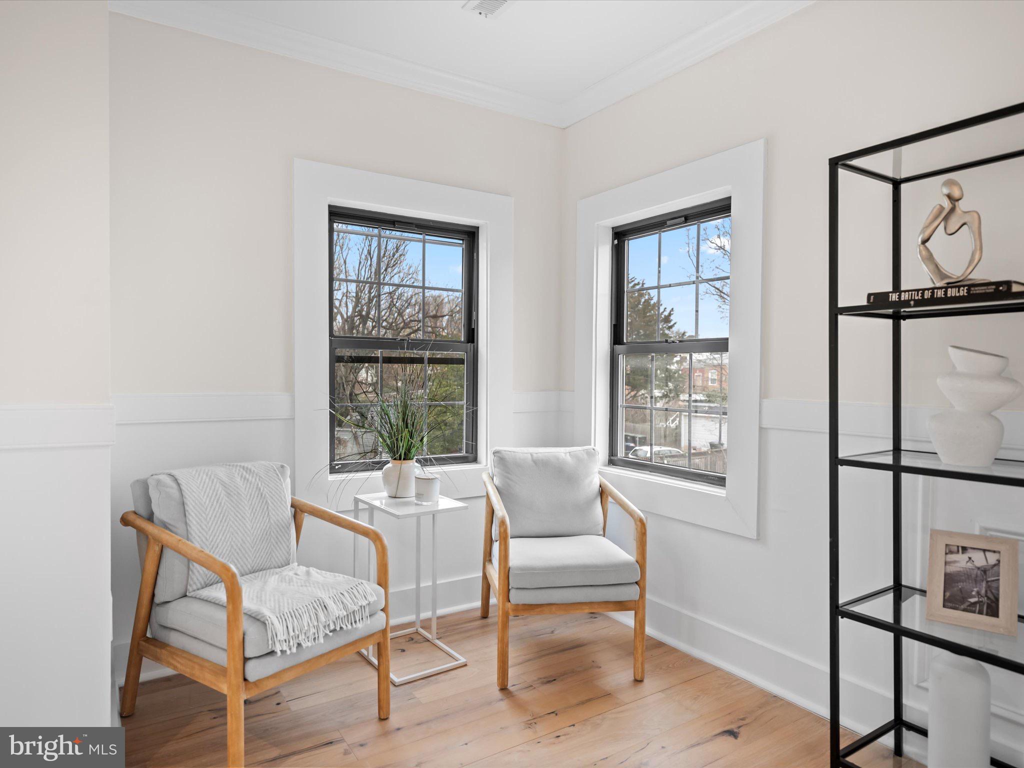 509 Randolph Street Northwest, Unit 2 Washington, DC 20011 - Photo 12 of 23 a living room with furniture a window and a table
