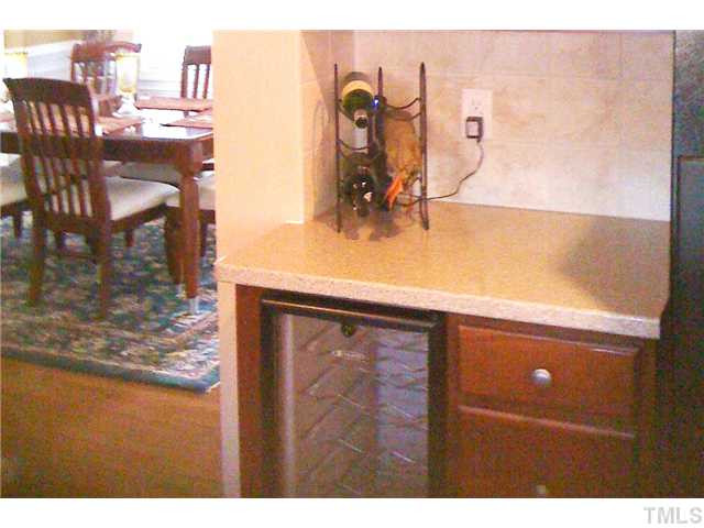 8620 Royton Circle Raleigh, NC 27613 - Photo 8 of 25 Fabulous bar area with wine cooler!