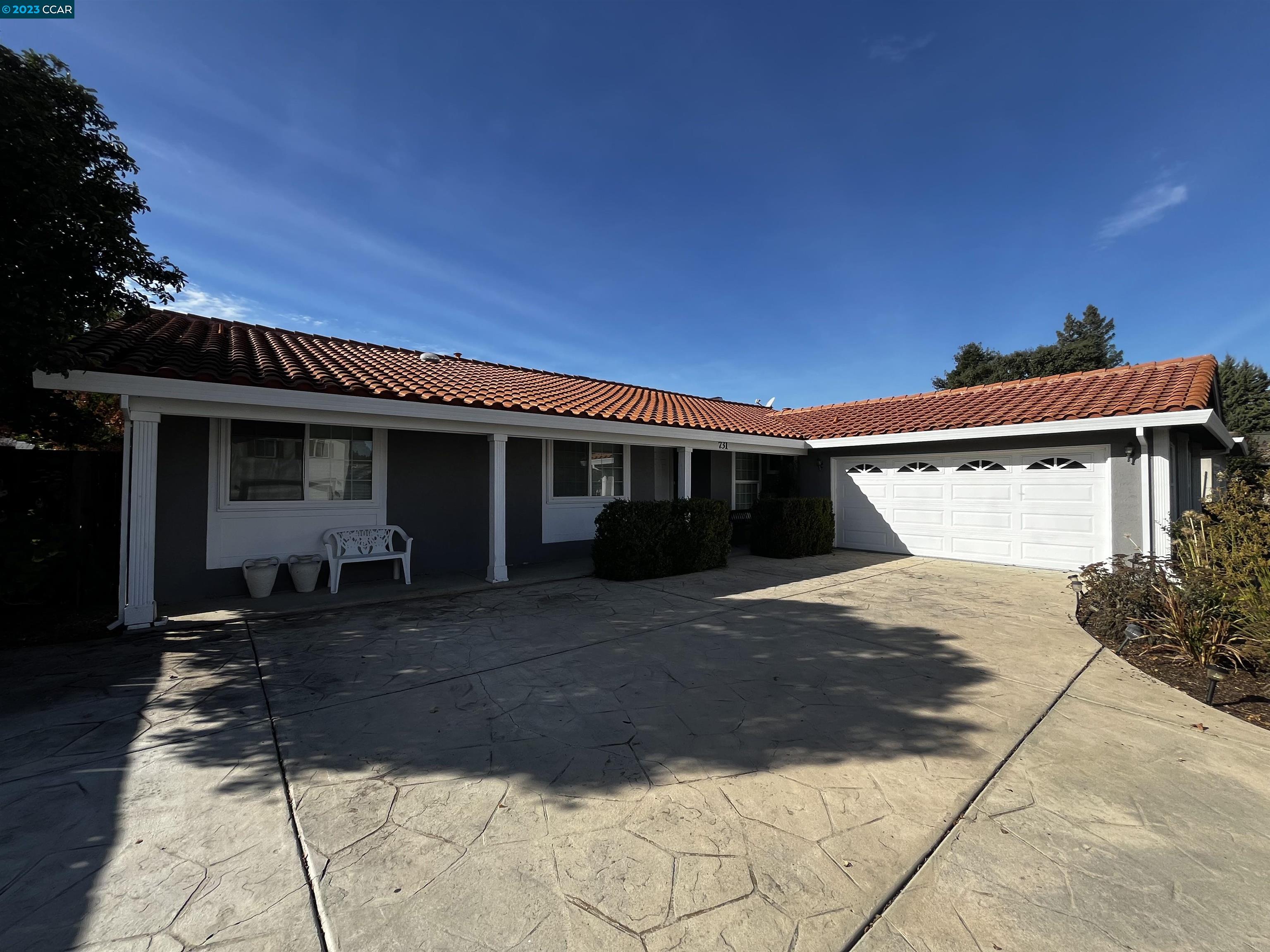 731 Graymont Circle Concord, CA 94518 - Photo 2 of 9 a front view of a house with a yard