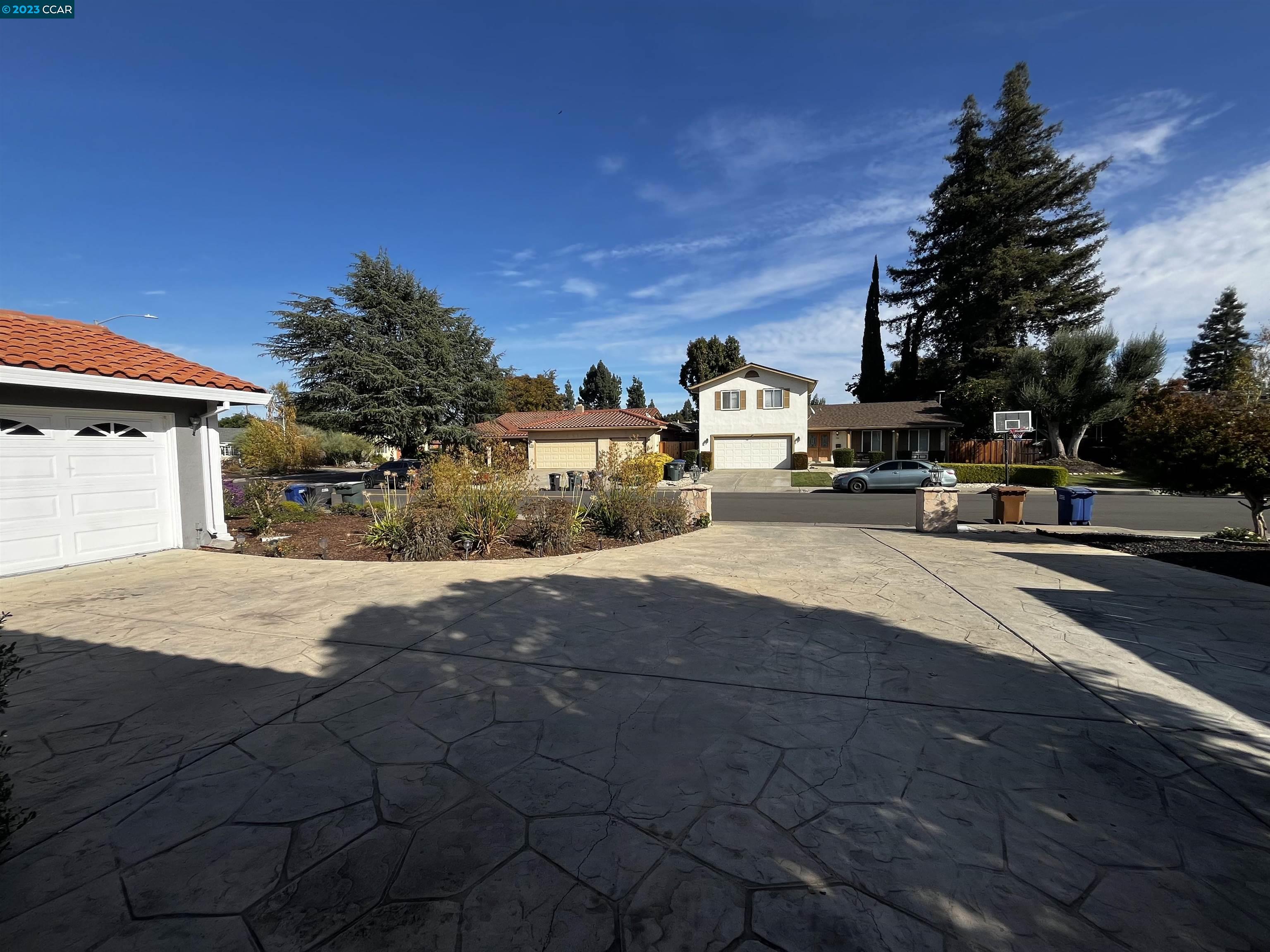 731 Graymont Circle Concord, CA 94518 - Photo 4 of 9 a car parked on the side of the road