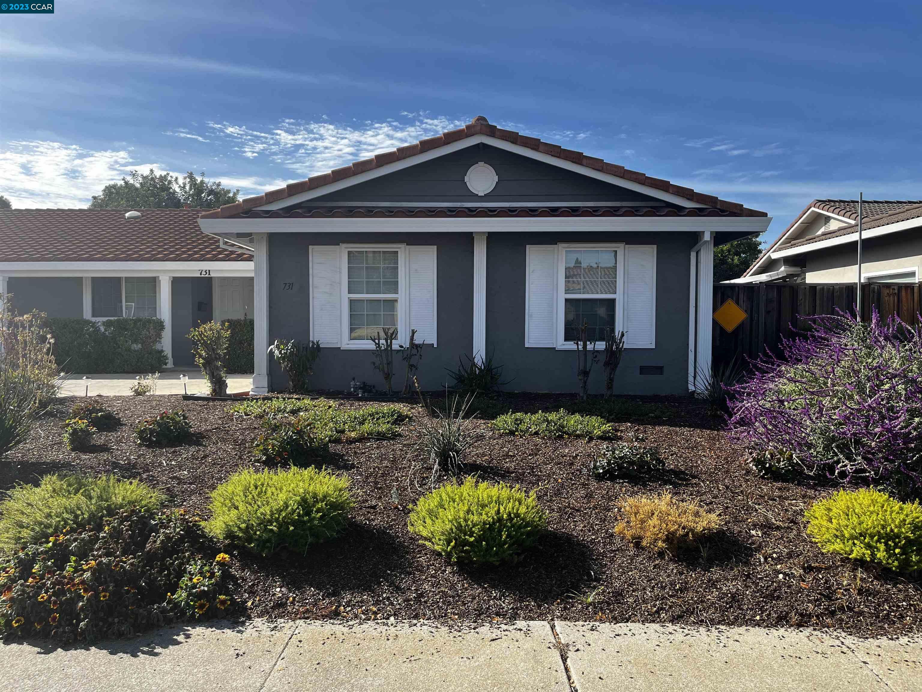 731 Graymont Circle Concord, CA 94518 - Photo 7 of 9 a front view of a house with a yard