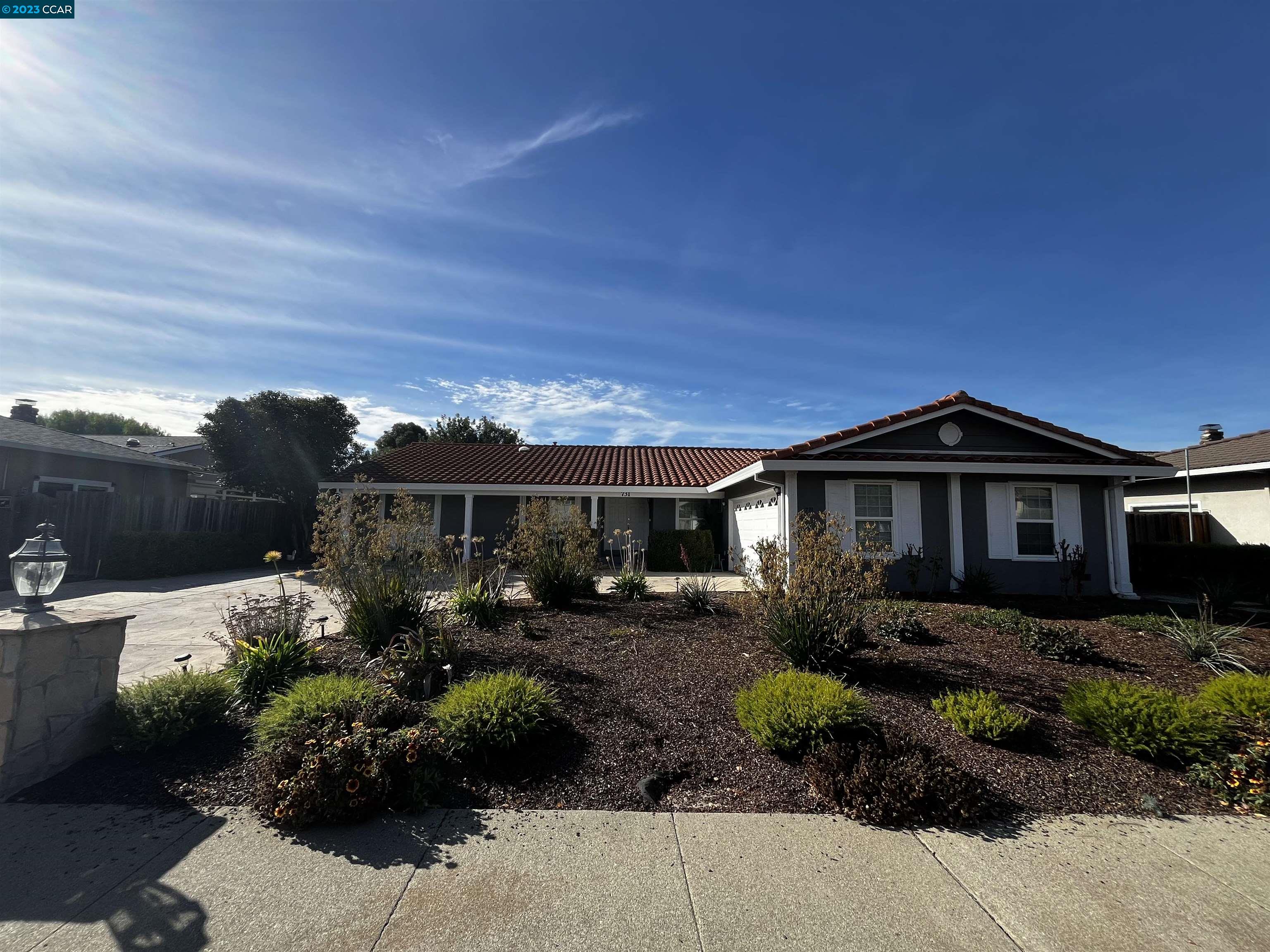 731 Graymont Circle Concord, CA 94518 - Photo 8 of 9 a front view of a house with a yard