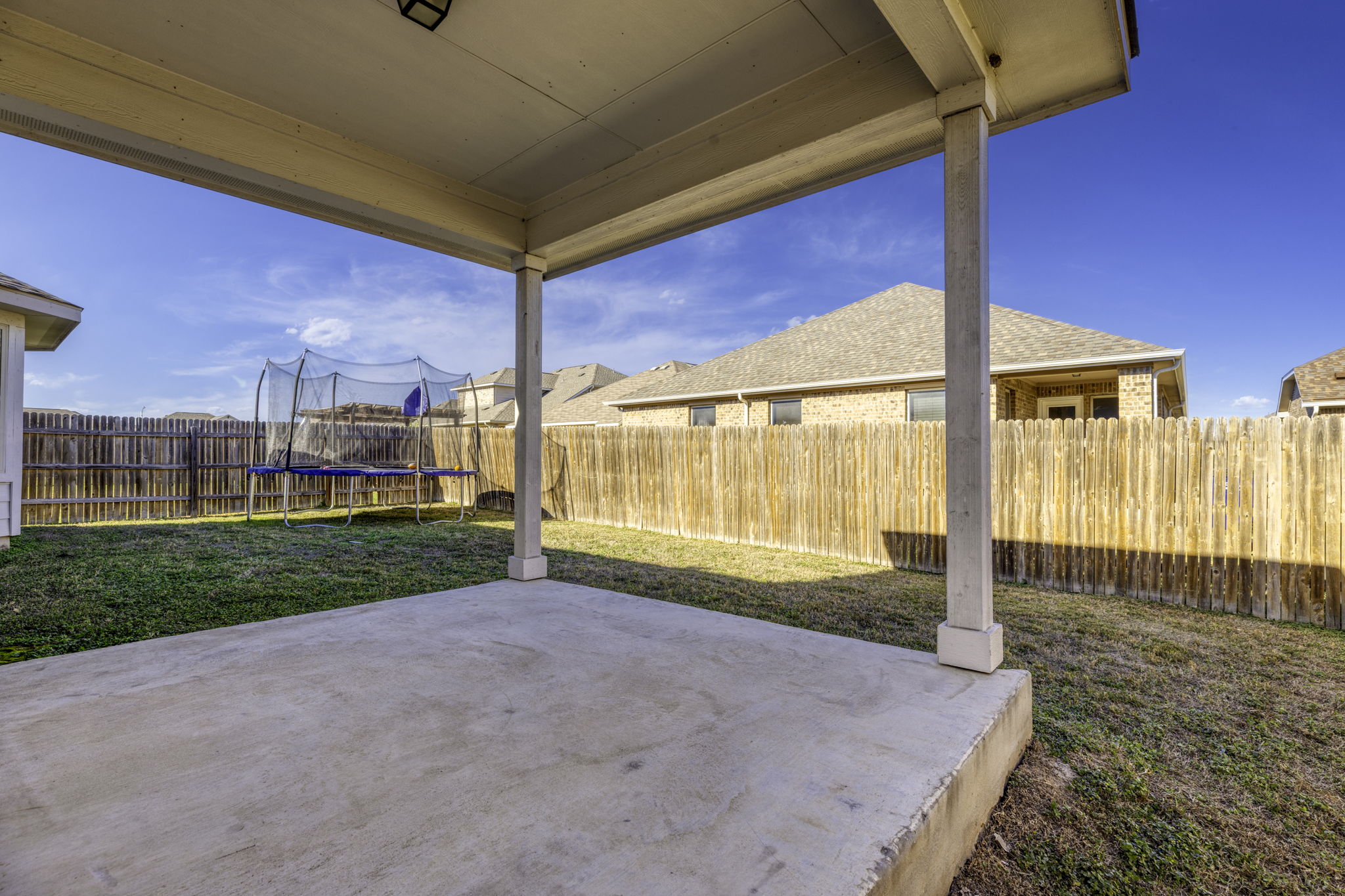 3116 Bragg Place Pflugerville, TX 78660 - Photo 24 of 29 a view of a house with a backyard