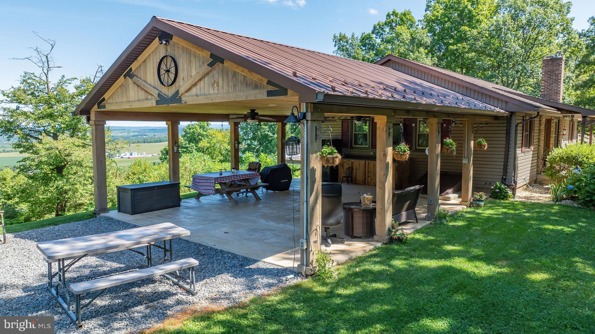 165 Mountain Road Danville, PA 17821 - Photo 4 of 10 Charming home with scenic outdoor space.