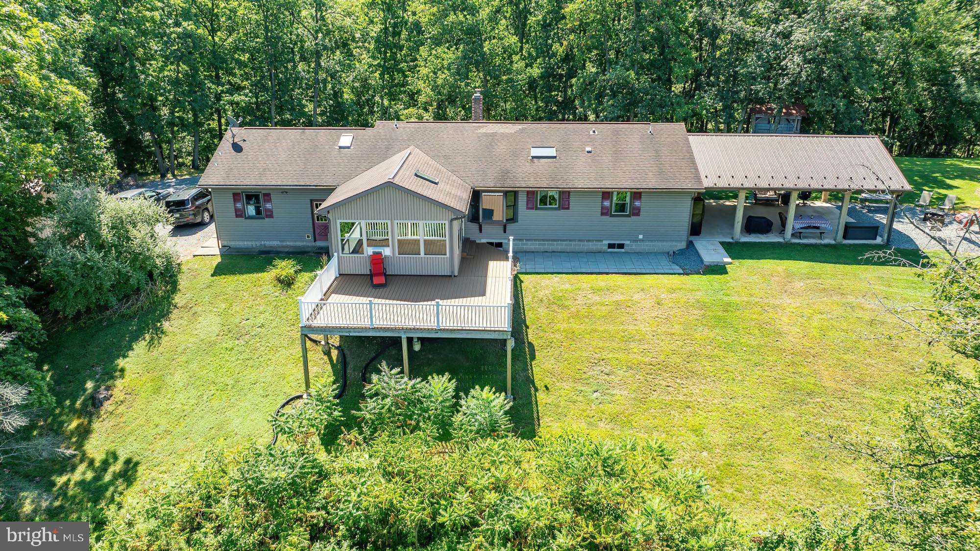 165 Mountain Road Danville, PA 17821 - Photo 5 of 10 Spacious home nestled in lush greenery.