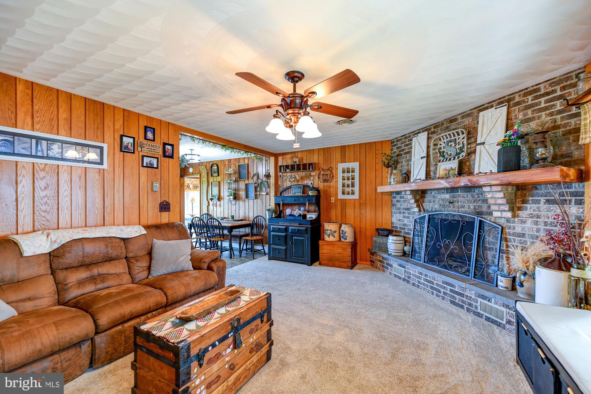 165 Mountain Road Danville, PA 17821 - Photo 6 of 10 Cozy living space with rustic charm.