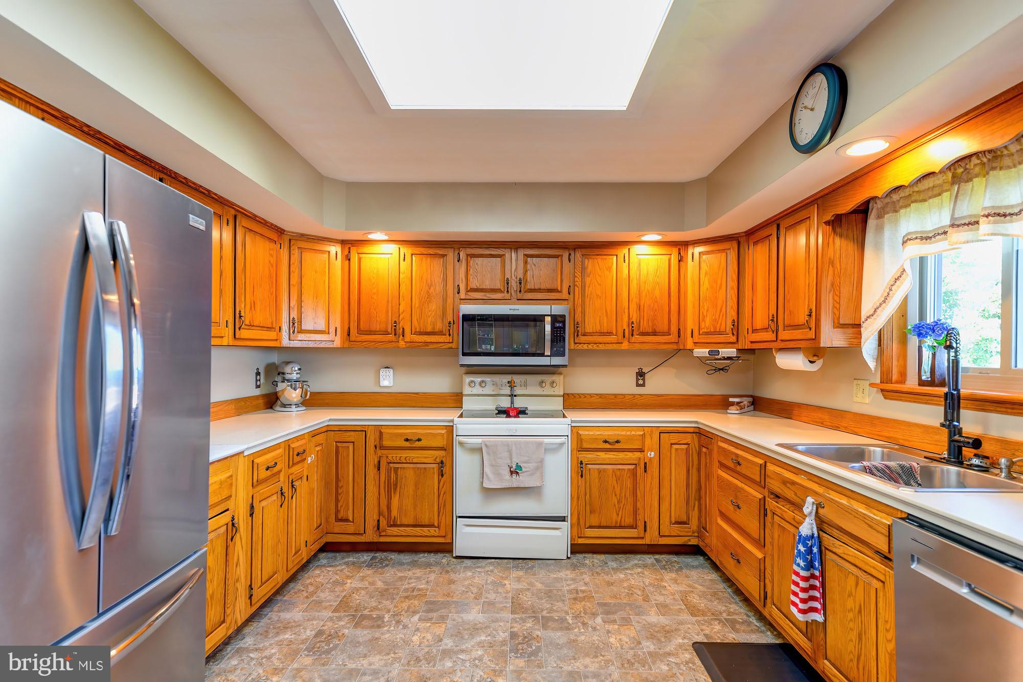 165 Mountain Road Danville, PA 17821 - Photo 7 of 10 Bright and inviting kitchen with warm wood tones.