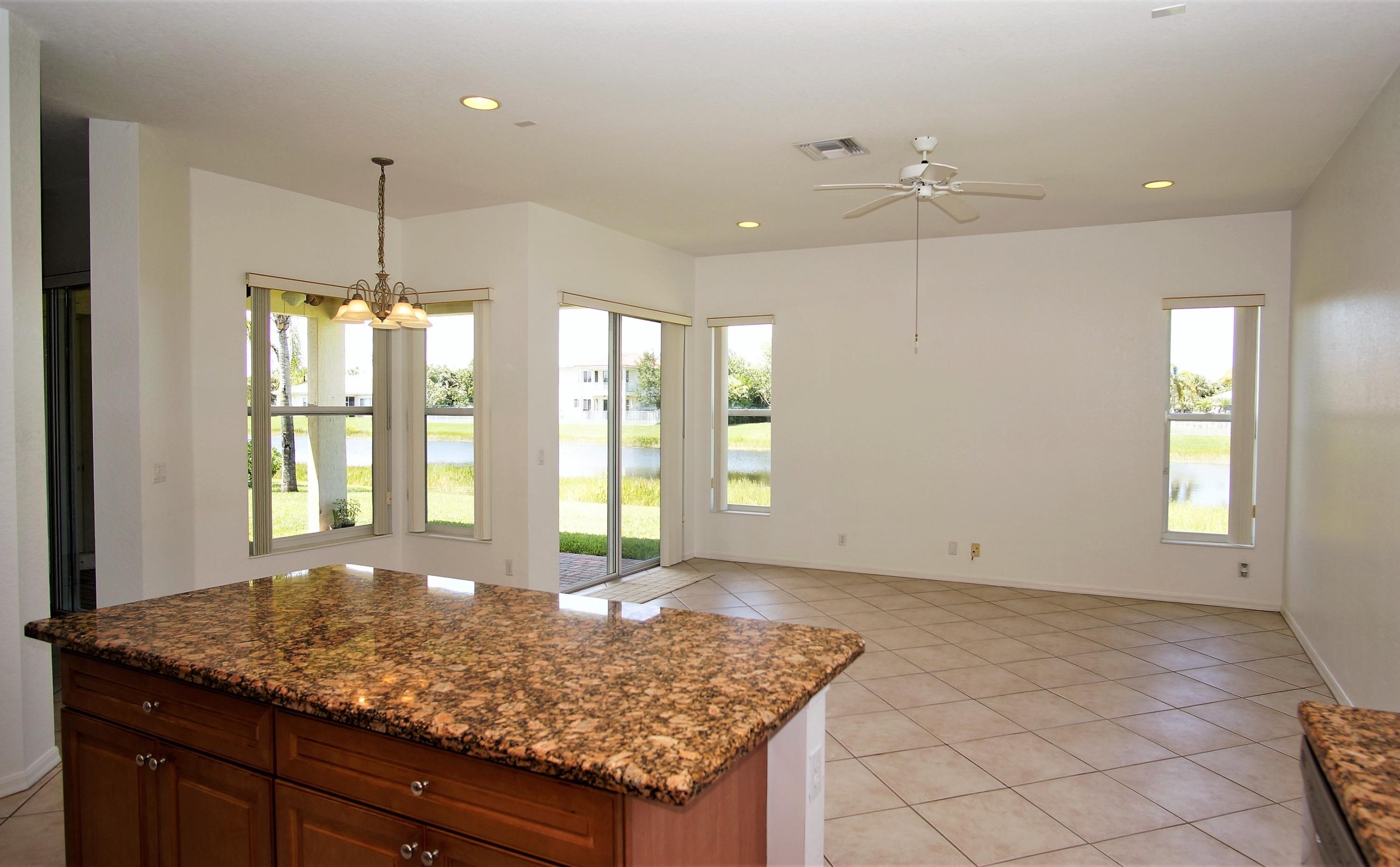 4688 Manderly Drive Wellington, FL 33449 - Photo 14 of 55 a view of an empty room and window