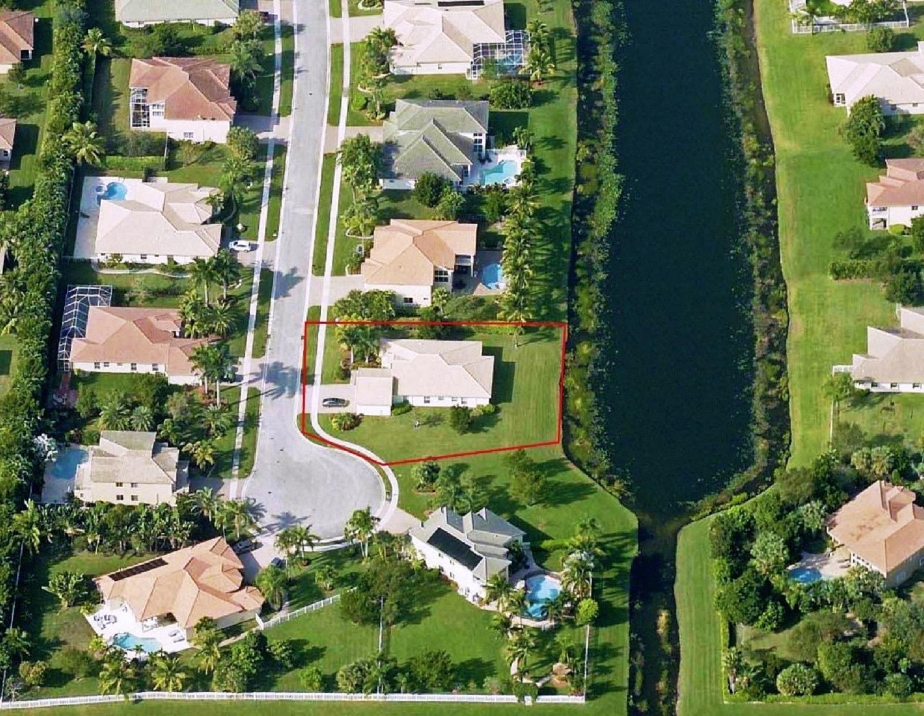 4688 Manderly Drive Wellington, FL 33449 - Photo 3 of 55 an aerial view of residential house with outdoor space and swimming pool