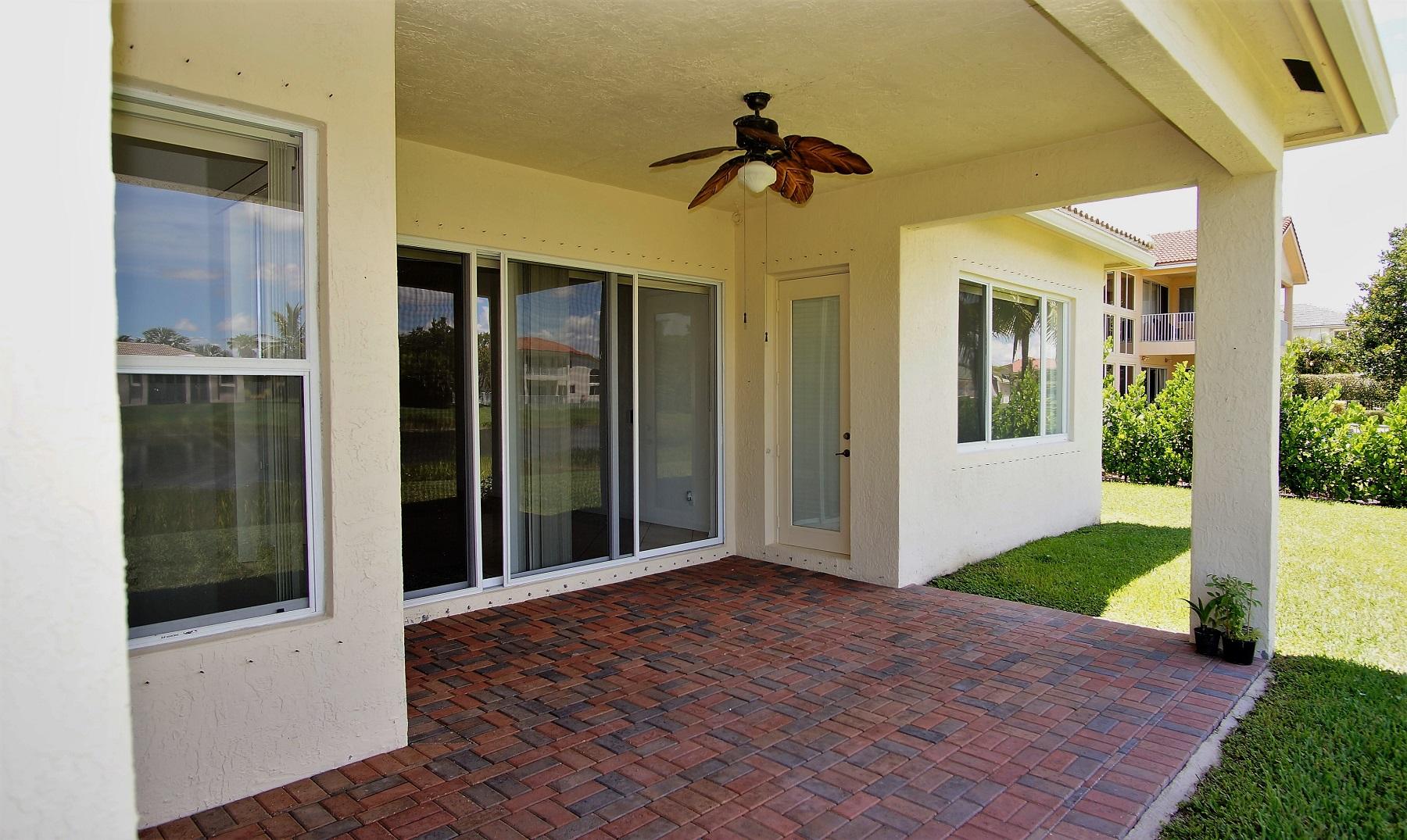 4688 Manderly Drive Wellington, FL 33449 - Photo 22 of 55 a view of a hallway with a door