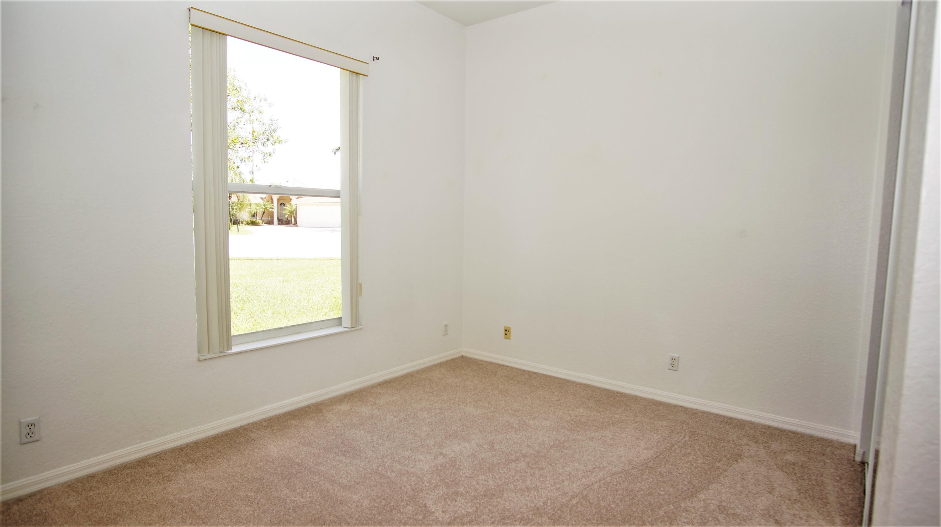 4688 Manderly Drive Wellington, FL 33449 - Photo 39 of 55 an empty room with a window
