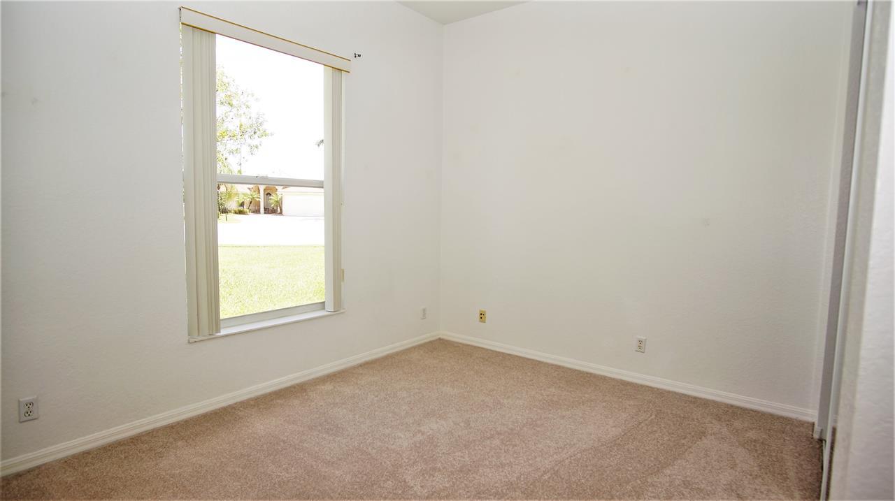 4688 Manderly Drive Wellington, FL 33449 - Photo 40 of 55 an empty room with a window