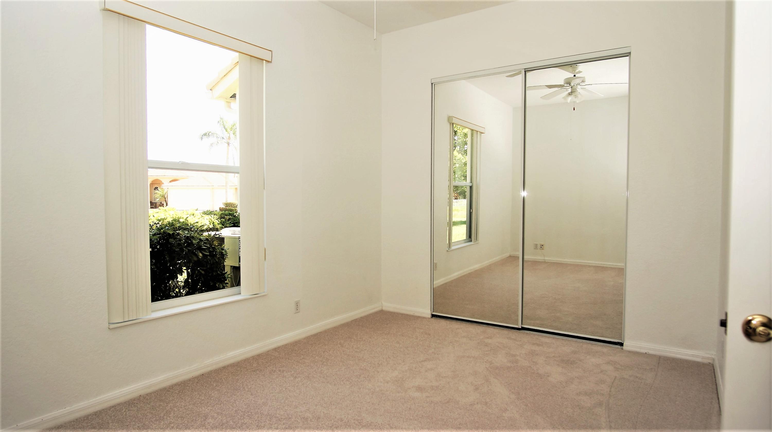 4688 Manderly Drive Wellington, FL 33449 - Photo 42 of 55 a view of an front door