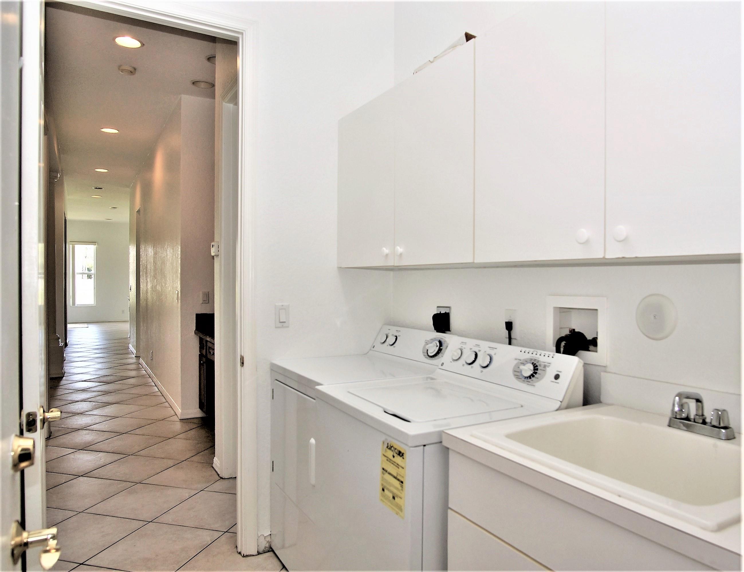4688 Manderly Drive Wellington, FL 33449 - Photo 45 of 55 a view of bathroom with dual sinks