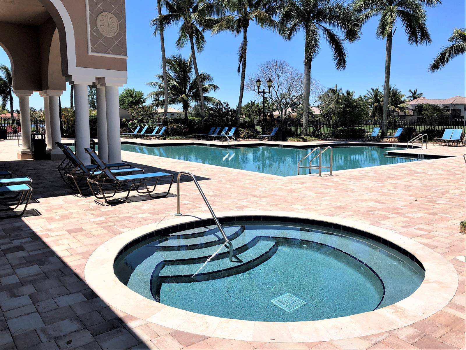 4688 Manderly Drive Wellington, FL 33449 - Photo 48 of 55 a view of swimming pool with a garden and palm trees