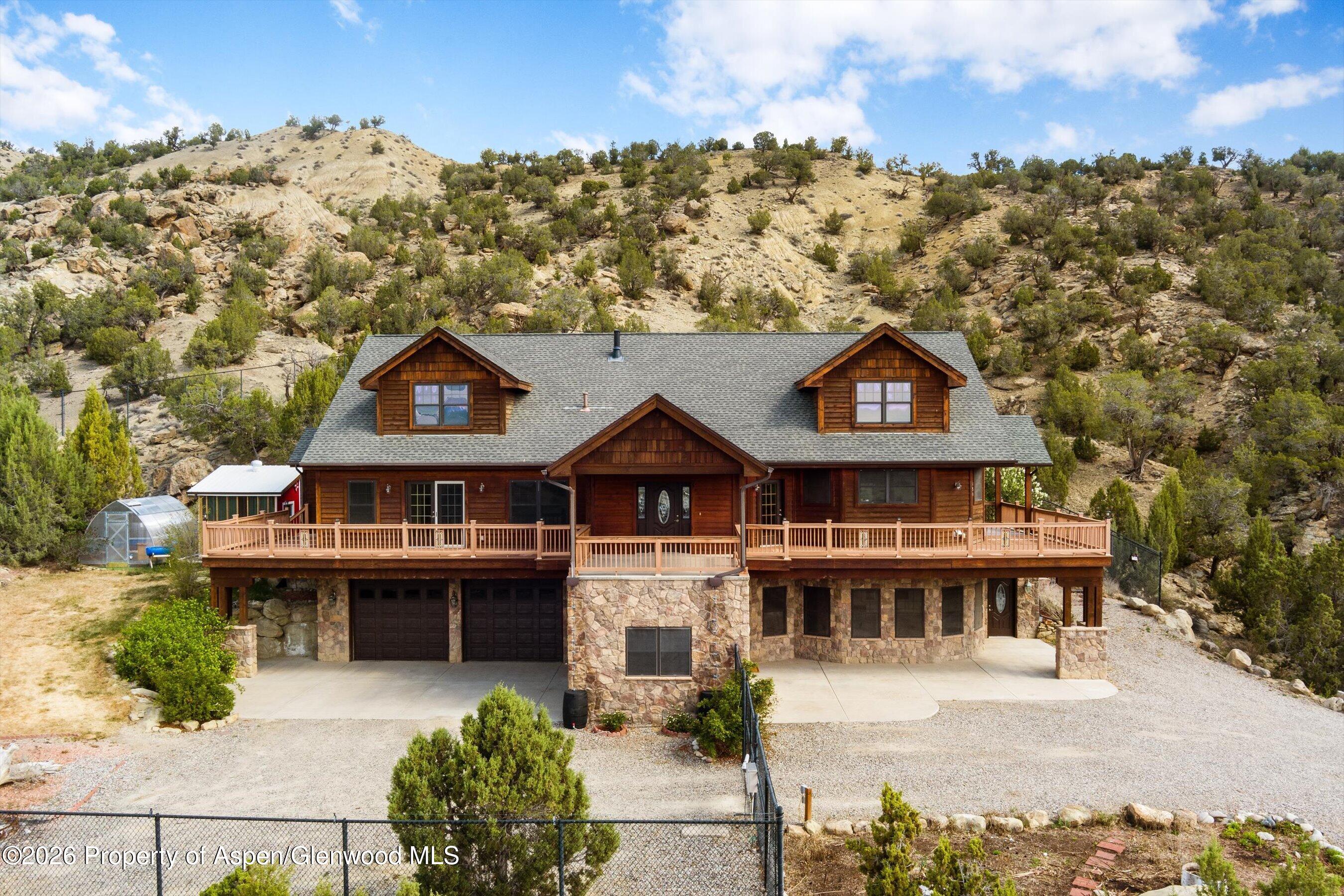 450 Summer Falls Road Silt, CO 81652 - Photo 46 of 50 an aerial view of a house with a yard