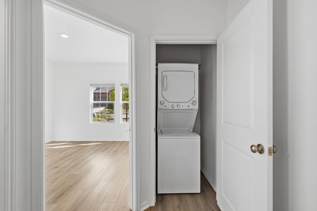 1233 Sweetspire Street Leander, TX 78641 - Photo 26 of 40 A second dedicated laundry area within the private guest suite adds convenience and independence.