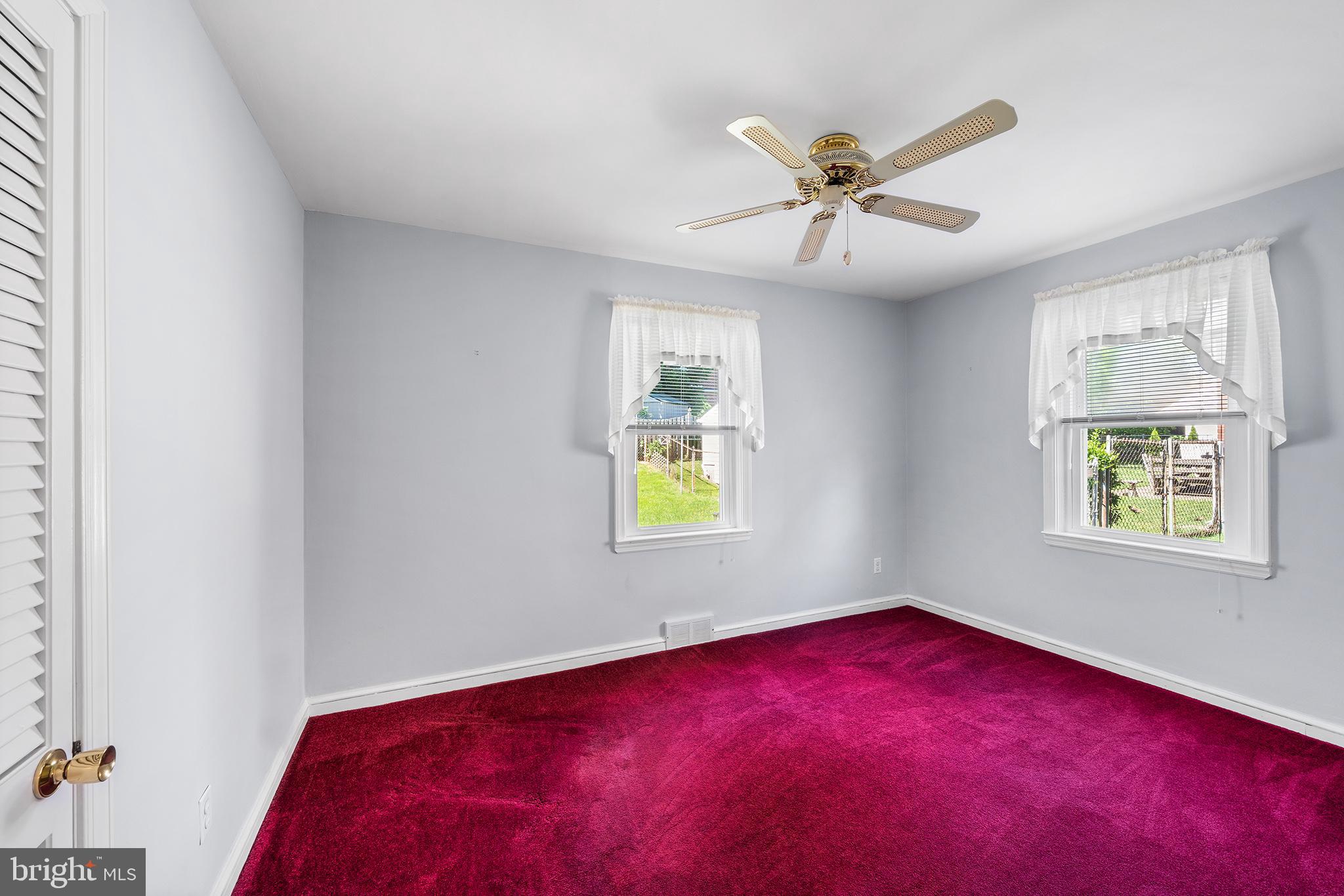 504 Lawrence Road Havertown, PA 19083 - Photo 9 of 20 an empty room with windows and fan
