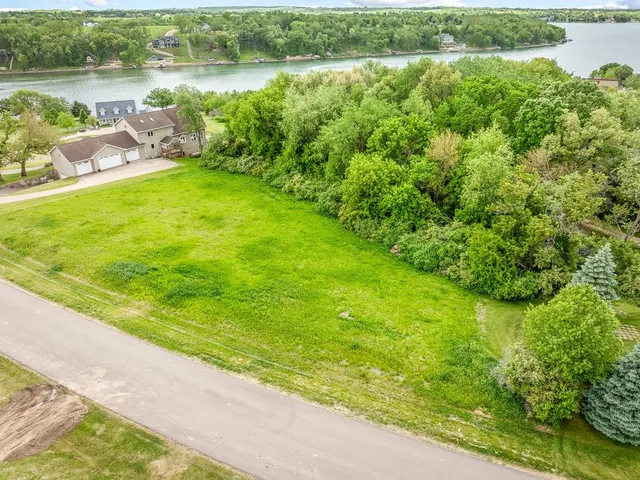 a view of a lake with a city