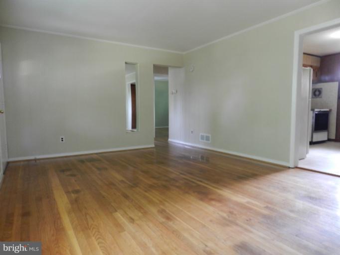3513 Greenly Street Silver Spring, MD 20906 - Photo 1 of 12 a view of an empty room and window
