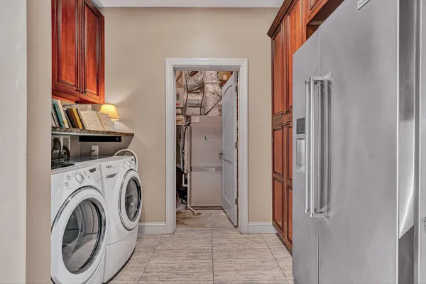 a spacious bathroom with a sink and a mirror