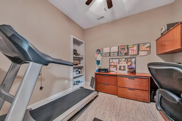 a view of a balcony with furniture