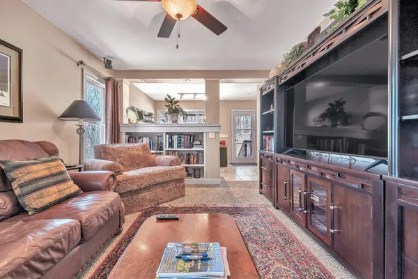 a view of yard with large trees