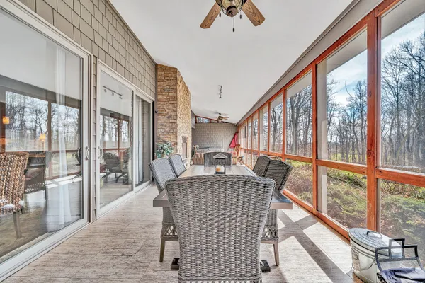 a view of a porch with seating space